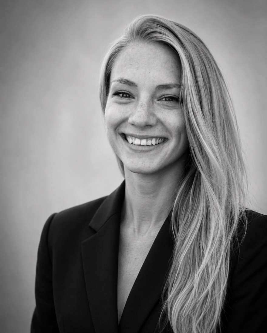 Beth Chappell smiling, black and white portrait