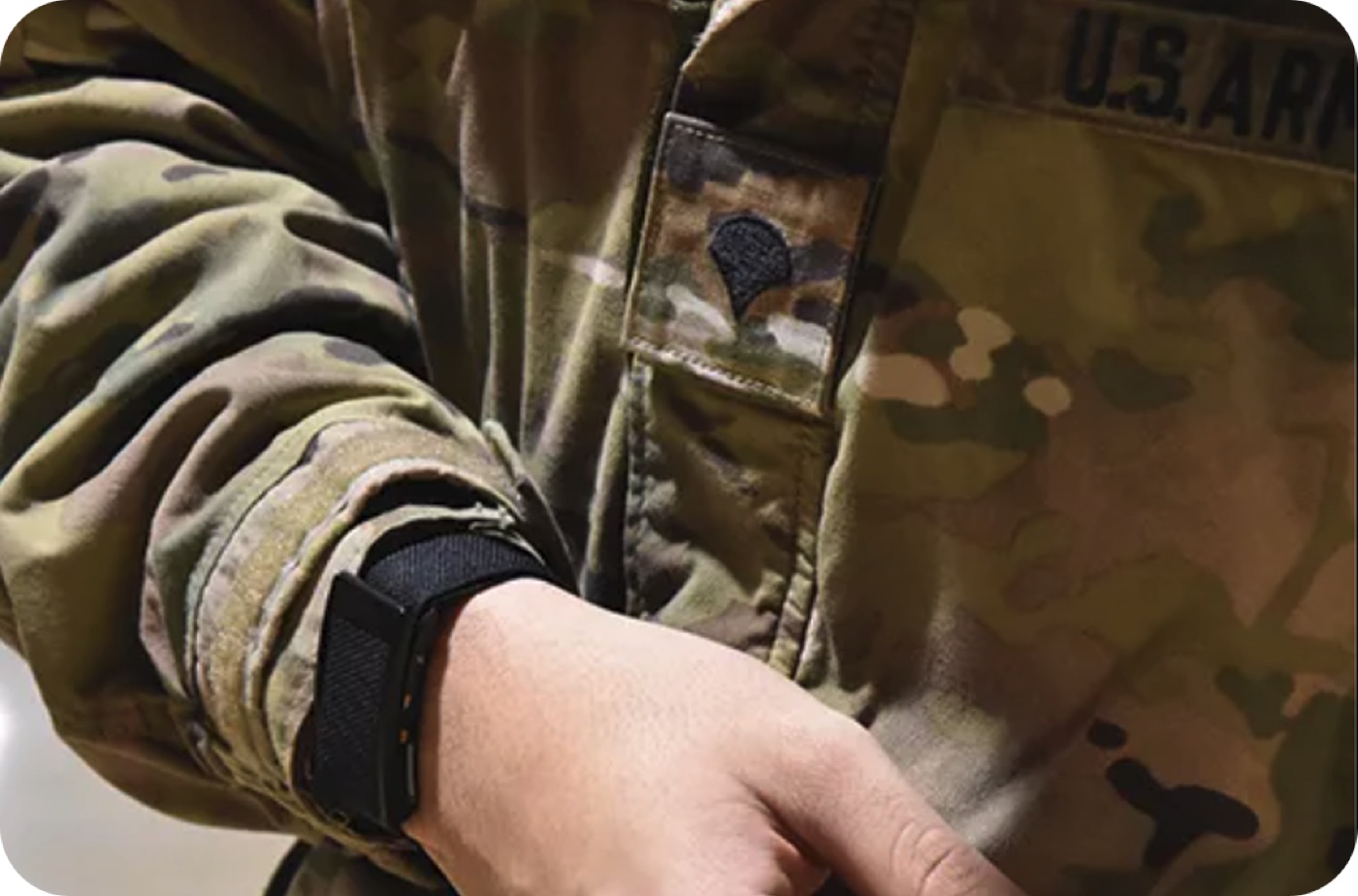 A soldier’s wrist wearing a WHOOP strap