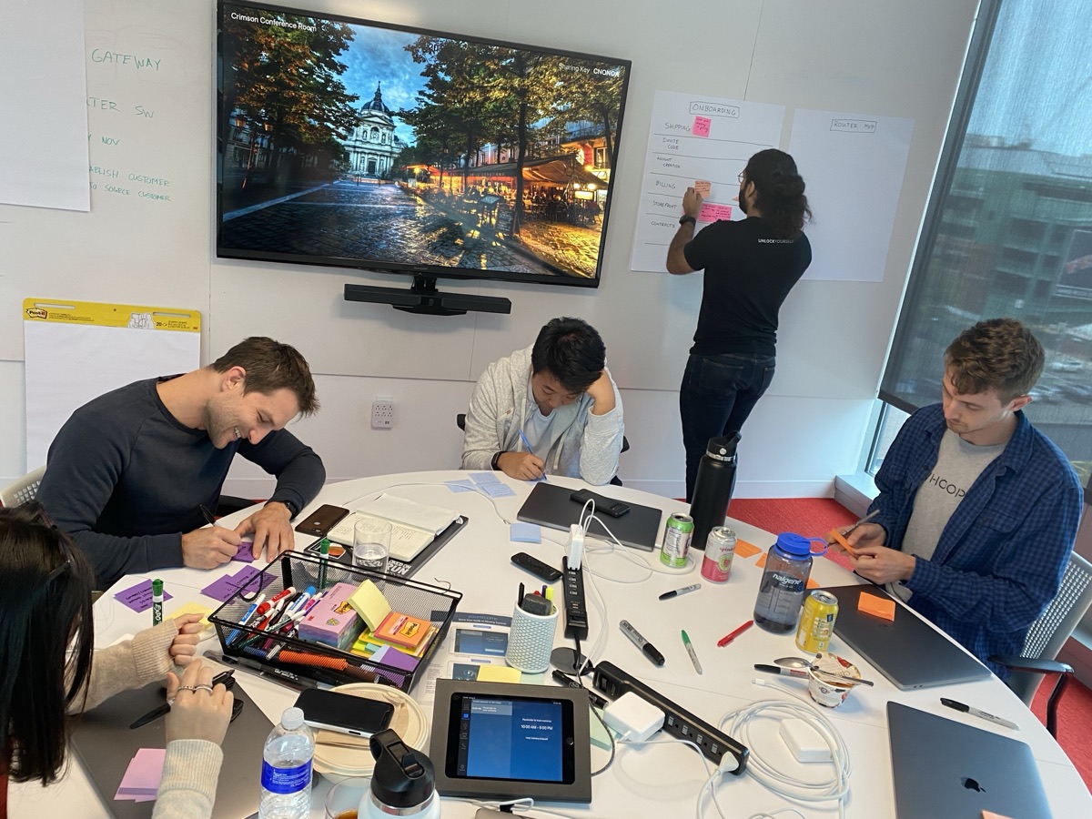 Teammates working through a workshop in the Boston office