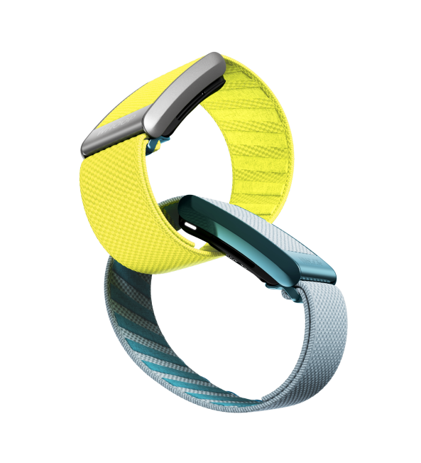 Two WHOOP straps, one yellow and one grey, looped together