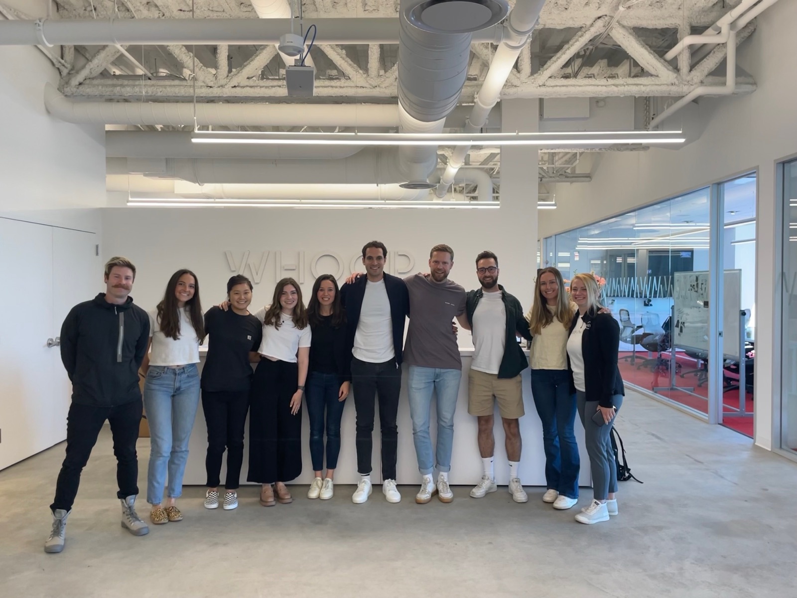 The WHOOP design team standing together in the office